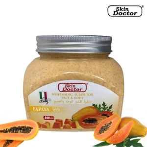 A 500ml bottle of Skin Doctor Papaya Whitening Scrub. The bottle has a white label with the Skin Doctor logo and product name, and the scrub is a light orange-pink color.