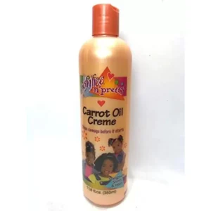 A 350ml bottle of Sofn'free n'pretty Carrot Oil Crème. The bottle has a yellow and orange label with the brand name and product name clearly displayed.