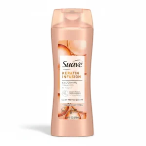 A 828ml bottle of Suave Tropical Coconut Shampoo & Conditioner. The bottle is white with a tropical leaf design and the Suave logo. The label displays the product name and key ingredients.