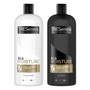 A set of two bottles, one shampoo and one conditioner, in the Tresemme Rich Moisture line. The bottles have a white and blue color scheme with the Tresemme logo prominently displayed.