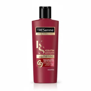Two bottles of TRESemme Moisture Rich Shampoo and Conditioner in a light blue and white color scheme. The bottles have the TRESemme logo and product name clearly displayed on the labels.