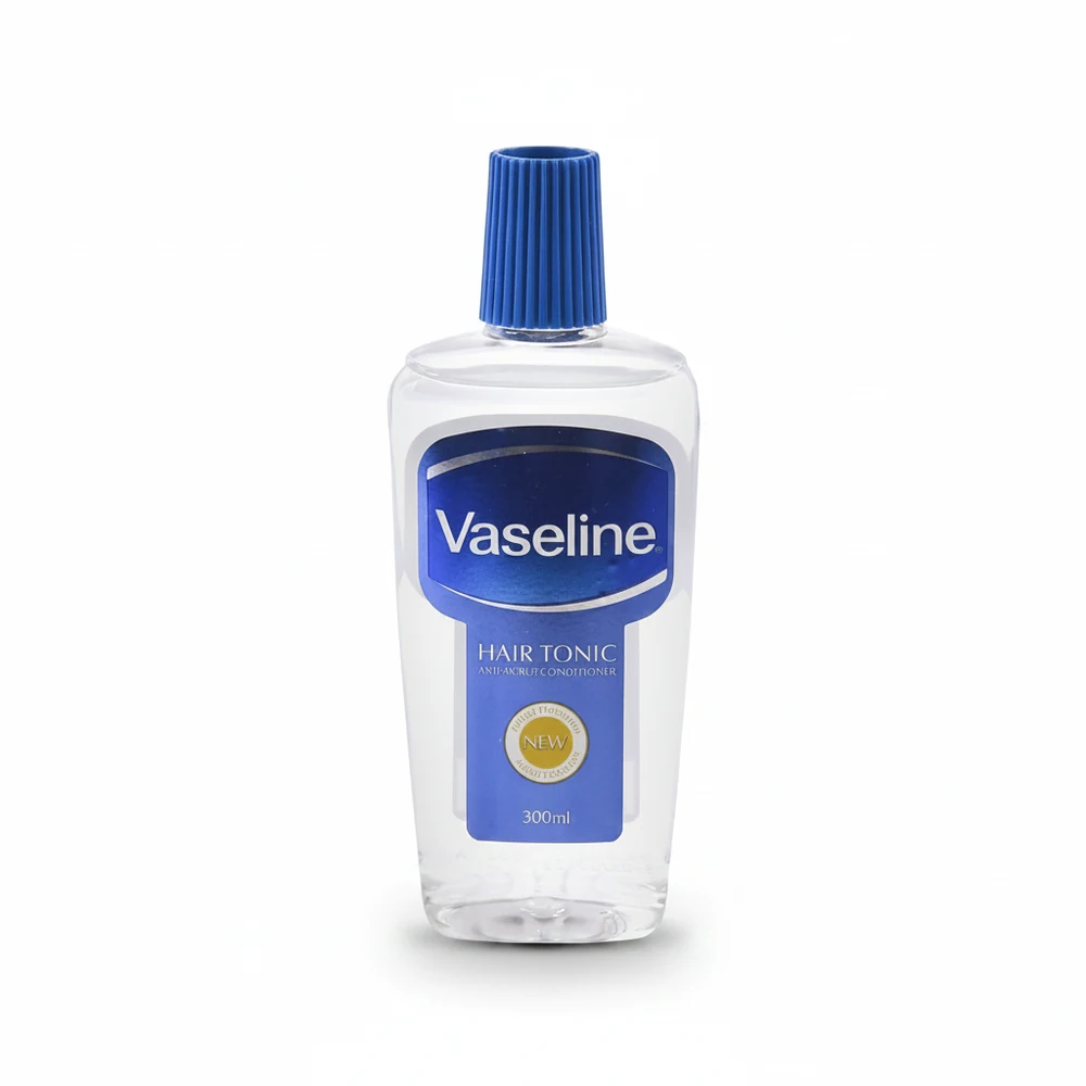 A 300ml bottle of Vaseline Hair Tonic. The bottle has a white label with the Vaseline logo and product name.