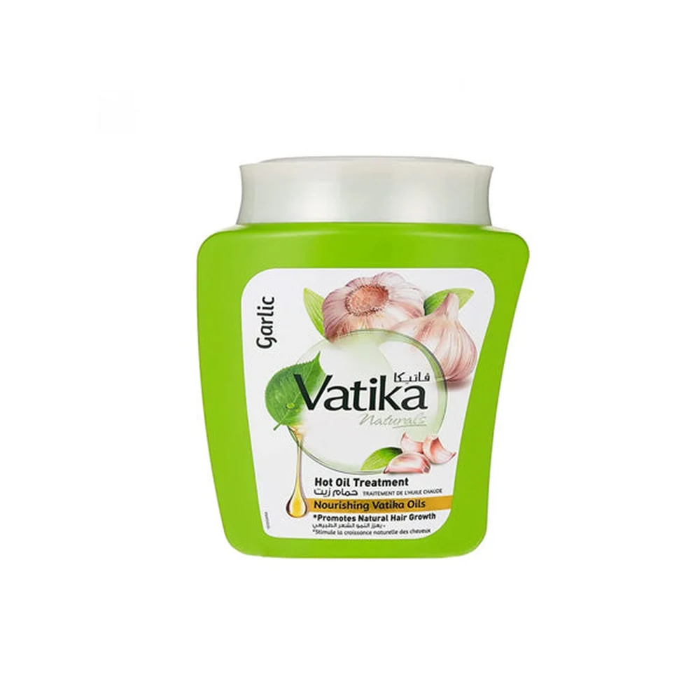 A 500g bottle of Vatika Hot Oil Hair Treatment. The bottle has a green and white label with the Vatika logo and product name.