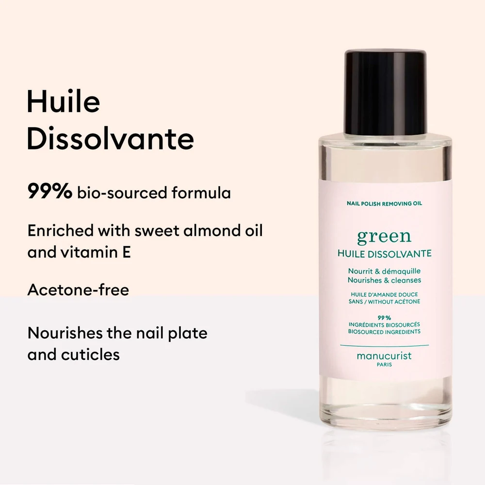 A green glass bottle with a white label, containing a green liquid nail polish remover.