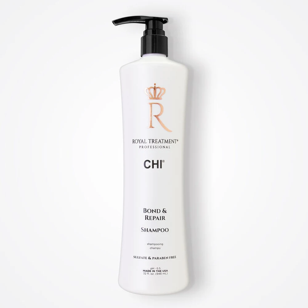 A 1000ml bottle of 100% Royal Parya Shampoo and Conditioner. The bottle has a white label with the product name and a royal parya flower graphic.