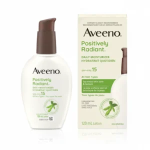 A white bottle of Aveeno Positively Radiant Daily Moisturizer with Broad Spectrum SPF 15 label. The bottle has a pump dispenser and is 120ml in size.