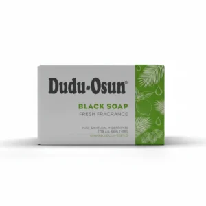 A round black bar of Dudu Osun African black soap with a white label
