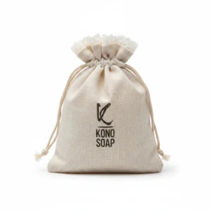 A rectangular bar of Kono Moisturizing Bar Soap with a light green color and a simple white label