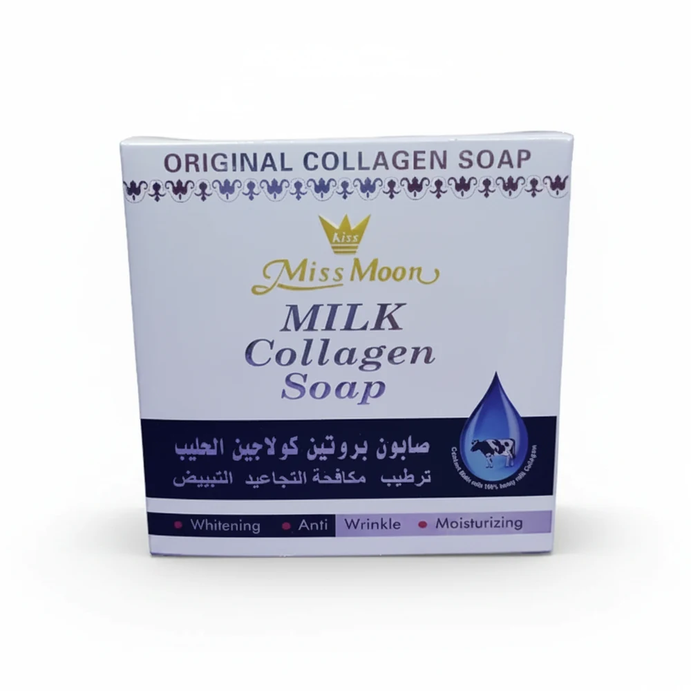 A rectangular bar of white soap with a honey and milk label on a light background