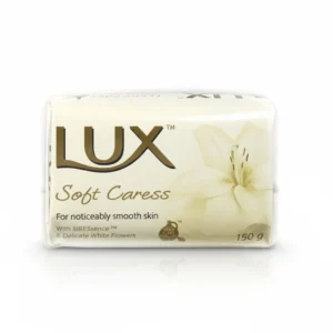 A rectangular bar of LUX Soft Caress Beauty Bar Soap in a light pink color, with the LUX logo and product name printed on the label.