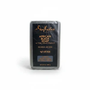 A rectangular black bar of SheaMoisture African Black Soap with the SheaMoisture logo and product name visible on the label.