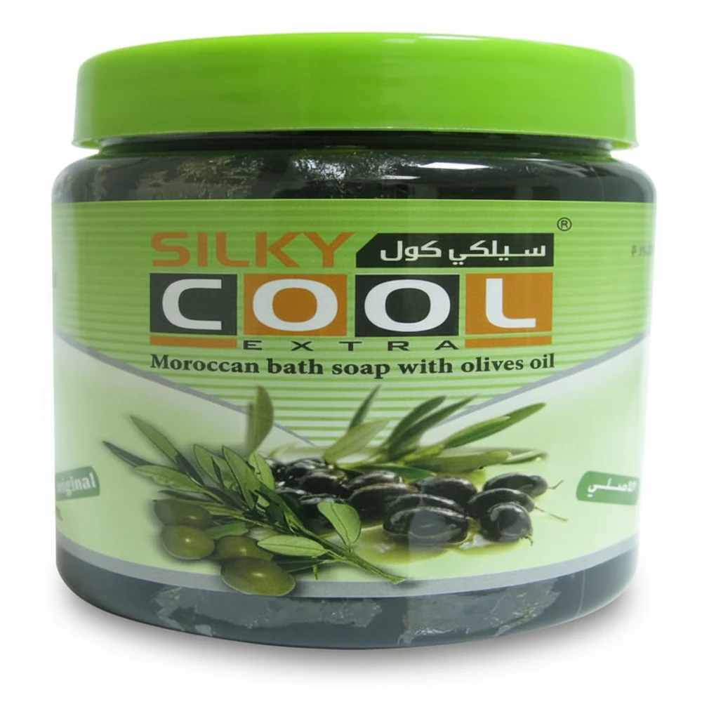 A round, light blue bar of Moroccan bath soap with a textured surface and a label featuring the Silky Cool brand name