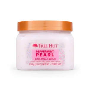 A pink and white jar of Tree Hut Shea Sugar Hydrating Body Scrub with a pink hibiscus flower design on the label