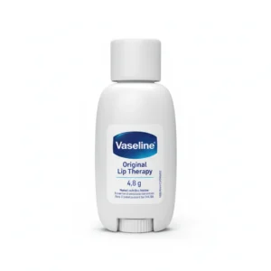 A small, round tin container with the Vaseline logo and 'Original Lip Therapy' label in white text on a blue background.