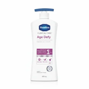 A white and blue bottle of Vaseline Clinical Care Age Defy Body Lotion. The label features the Vaseline logo and indicates it is a 400ml size.