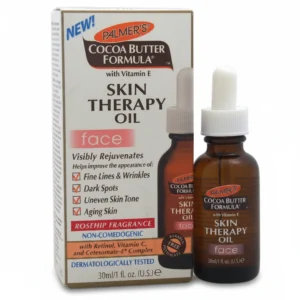 A bottle of PALMERS Cocoa Butter Formula Skin Therapy Oil with a rose-colored label and cap. The bottle contains 5.1 Oz of product.