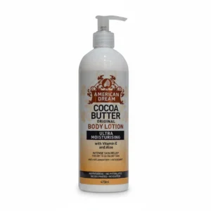 A 473ml bottle of American Dream Cocoa Butter Original Body Lotion. The bottle has a white label with the brand name and product name printed in black text.