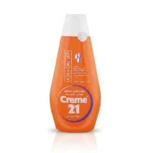 A white and blue bottle of Creme 21 body lotion with a label showing the brand name and product details